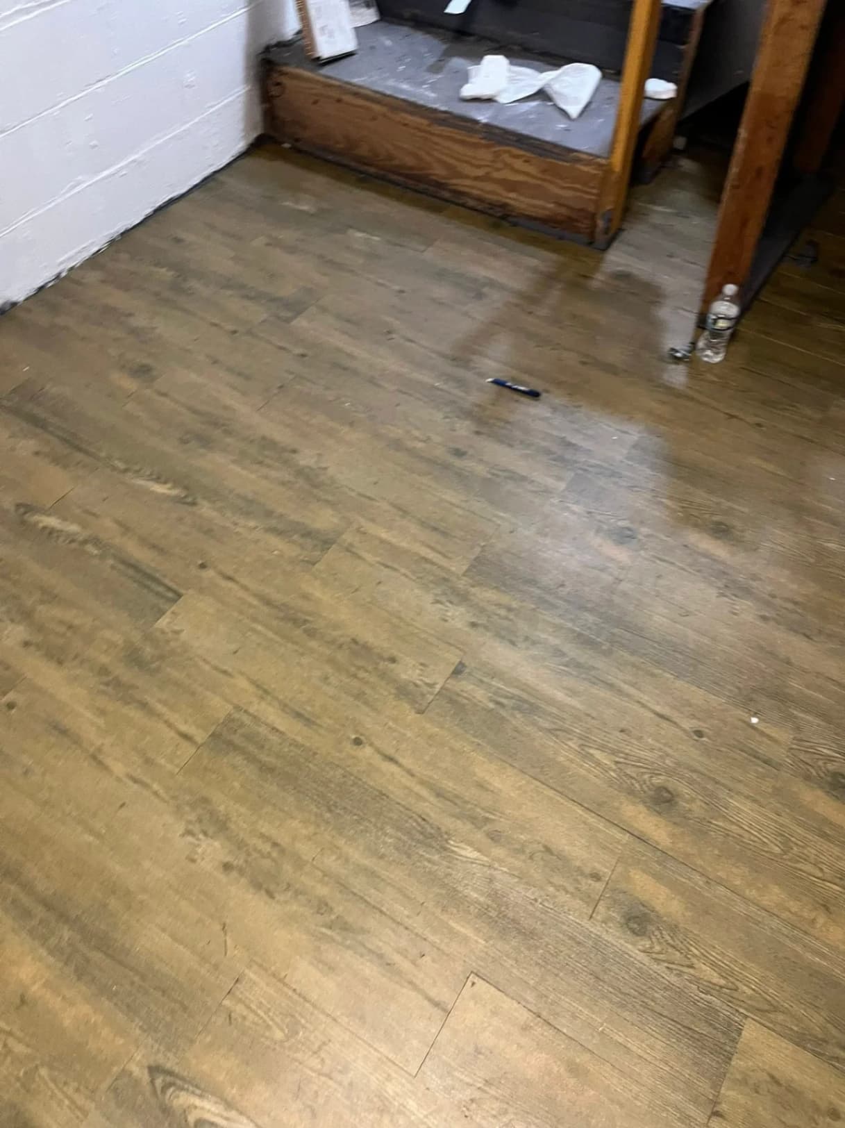 Basement Luxury Vinyl Plank Flooring Installation photo 2