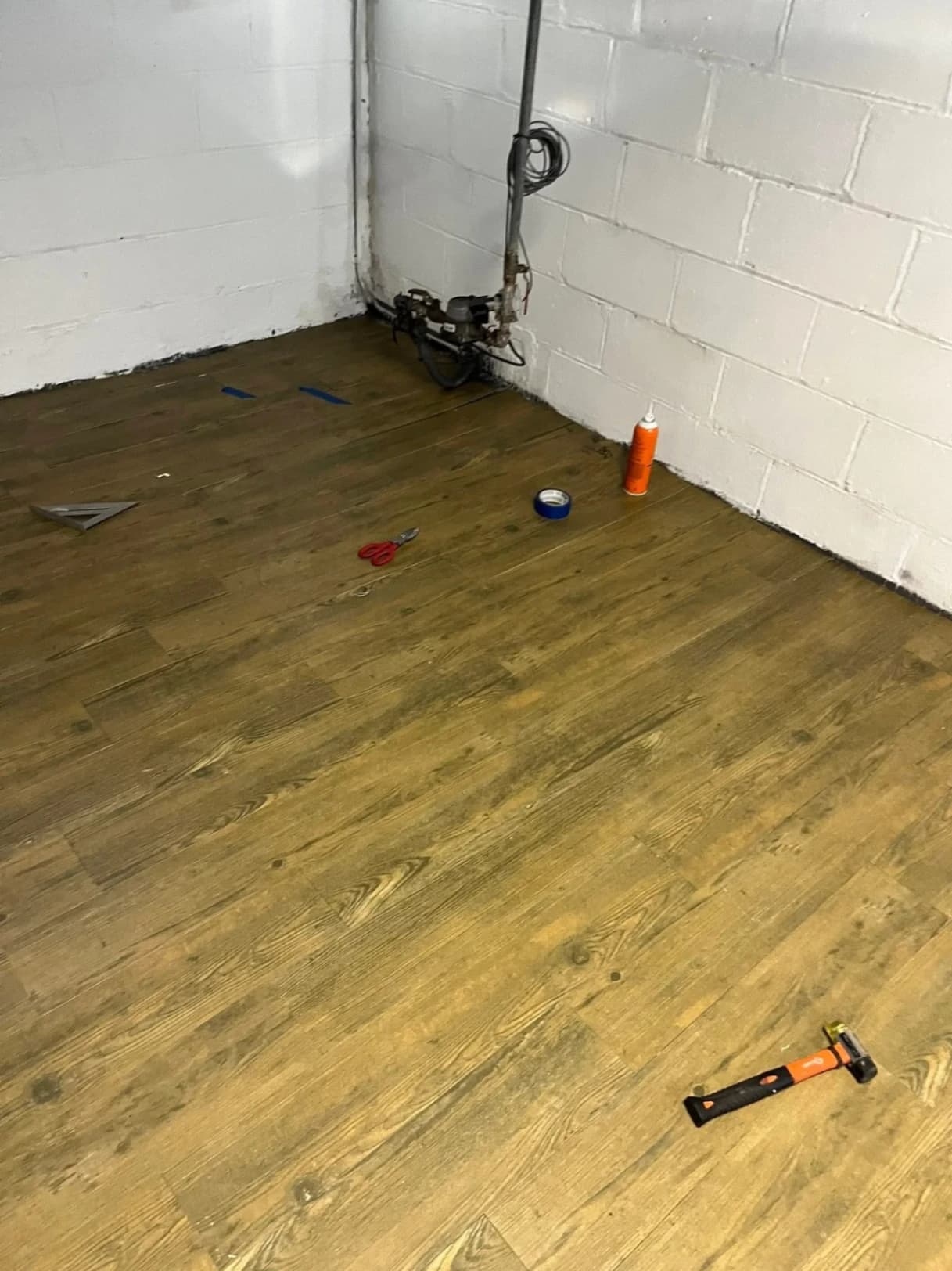 Basement Luxury Vinyl Plank Flooring Installation photo 5