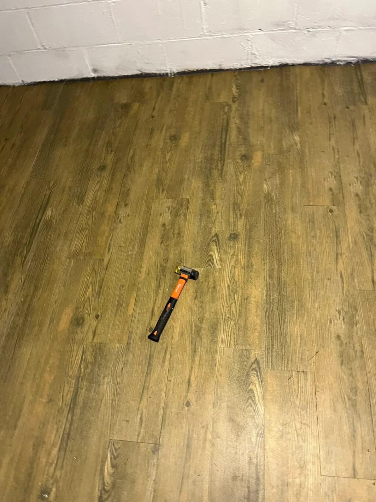 Basement Luxury Vinyl Plank Flooring Installation photo 6