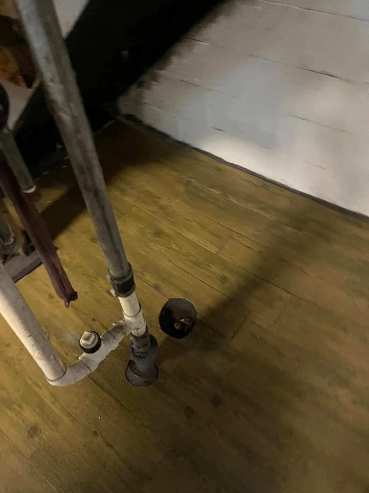 Basement Luxury Vinyl Plank Flooring Installation photo 4